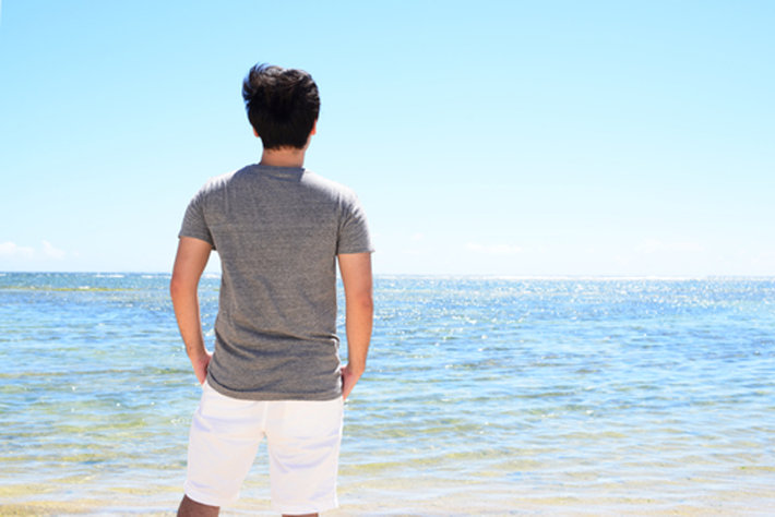 Young man looking at the sea