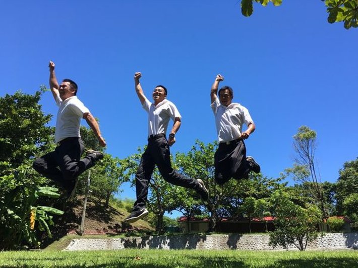 Staff Members jumping